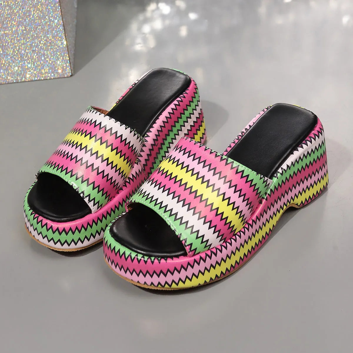 Women's wedge sandals with wave print pattern showing fish mouth toe and thick rubber sole