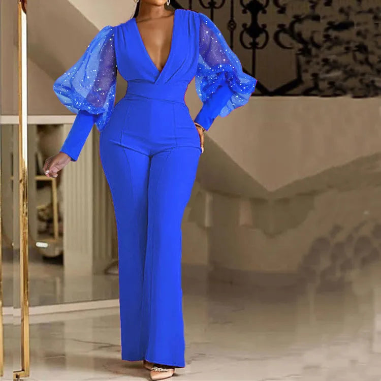 Red mesh stitching long sleeve jumpsuit with elastic waist and wide leg trousers on mannequin