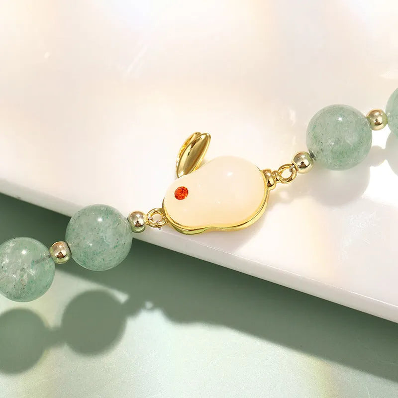 Rabbit bracelet with green aventurine and strawberry quartz beads, copper and gold-plated details