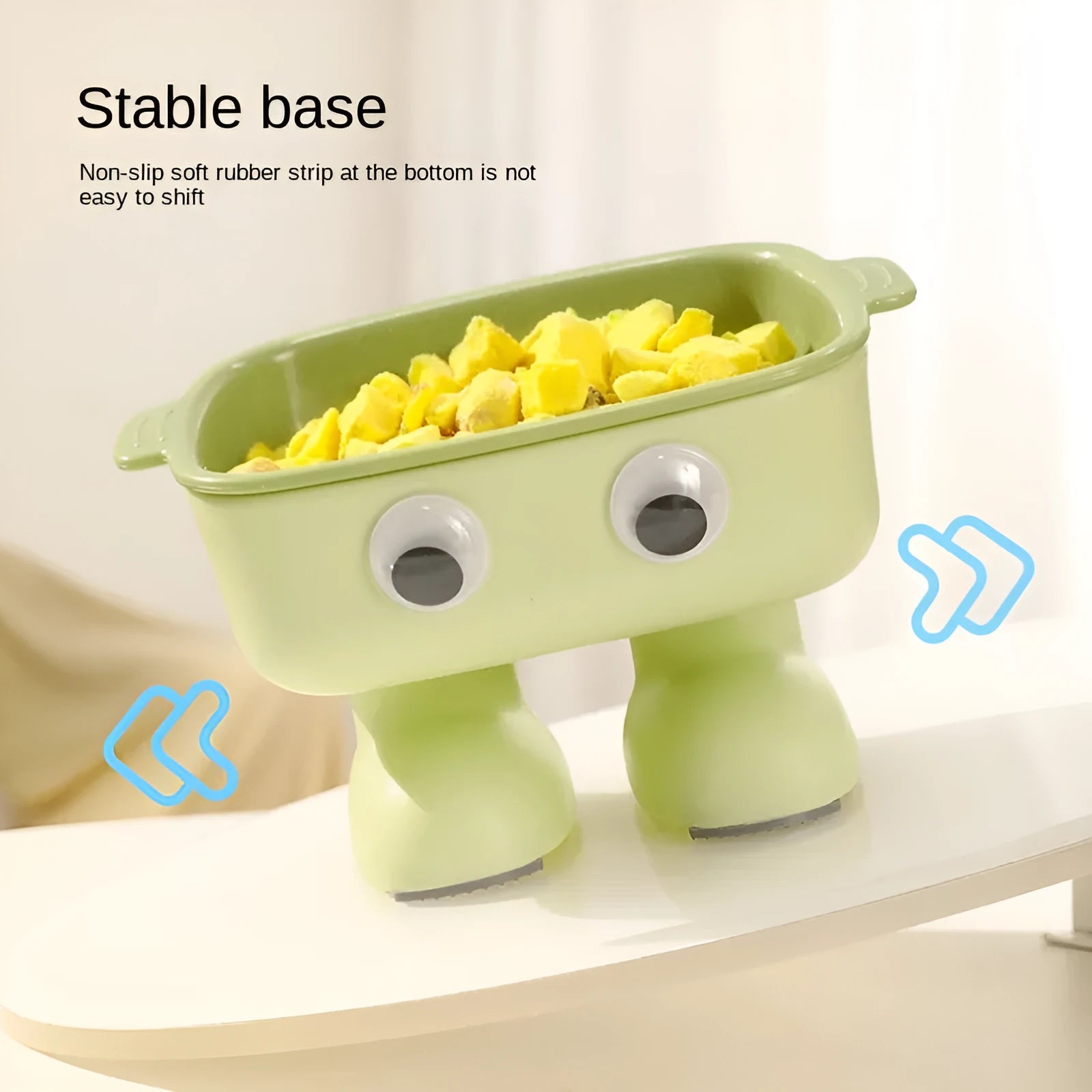 Green robot-shaped elevated cat bowl with tilted food surface and non-slip base
