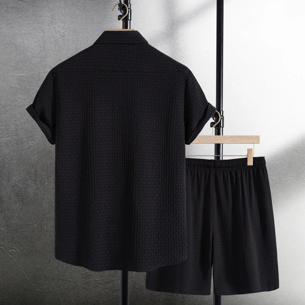 Men's casual cotton blend short sleeve shirt and shorts set in black, laid flat.