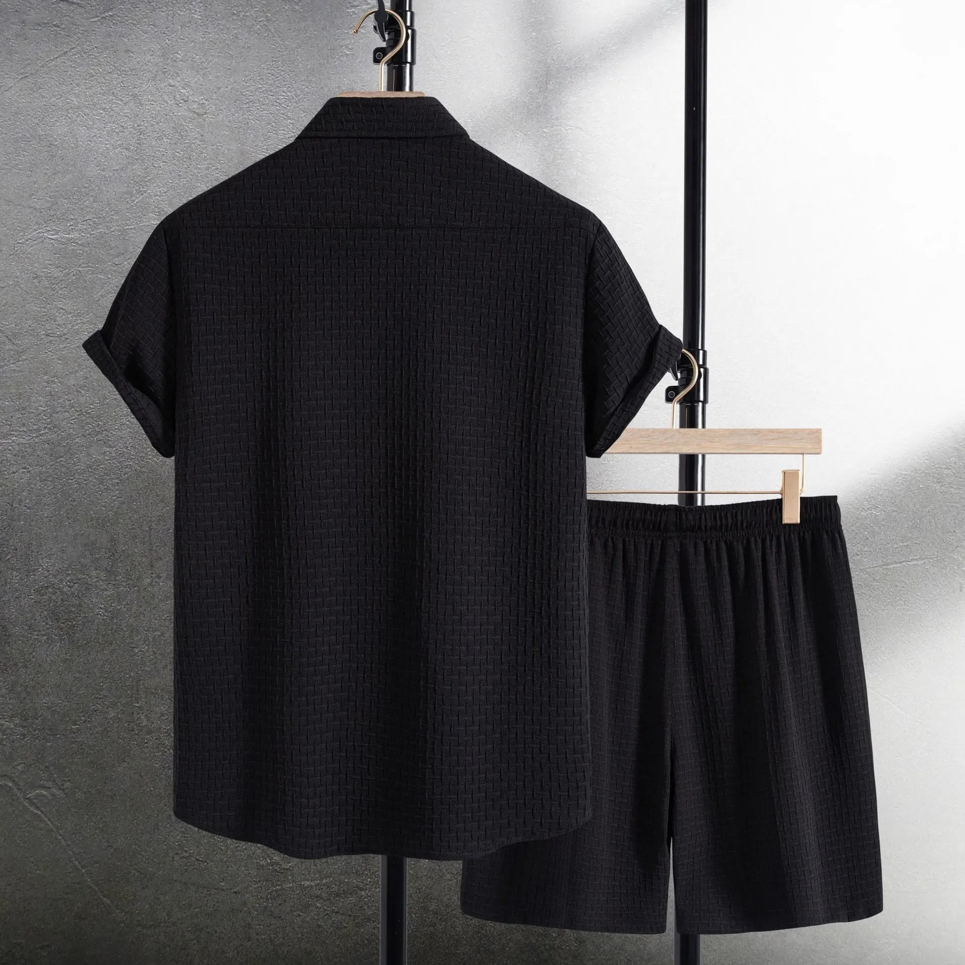 Men's casual cotton blend short sleeve shirt and shorts set in black, laid flat.