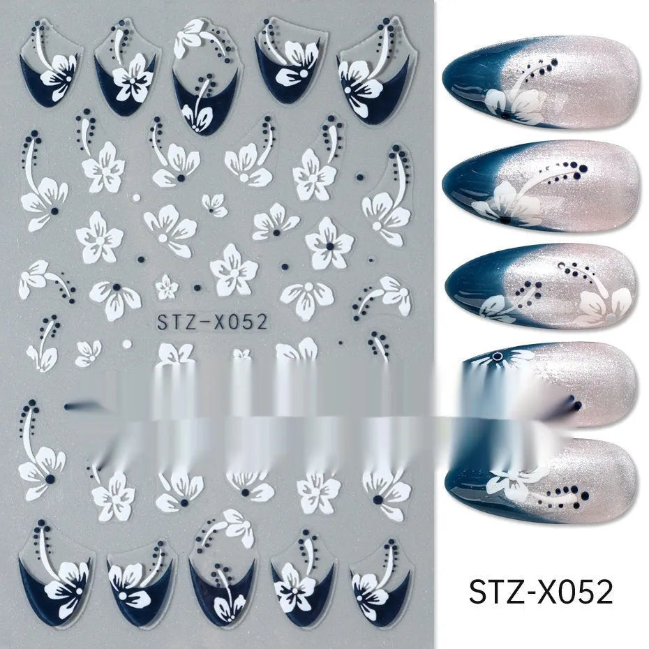Cartoon-themed nail art sticker sheet with black and silver strip patterns and love motifs
