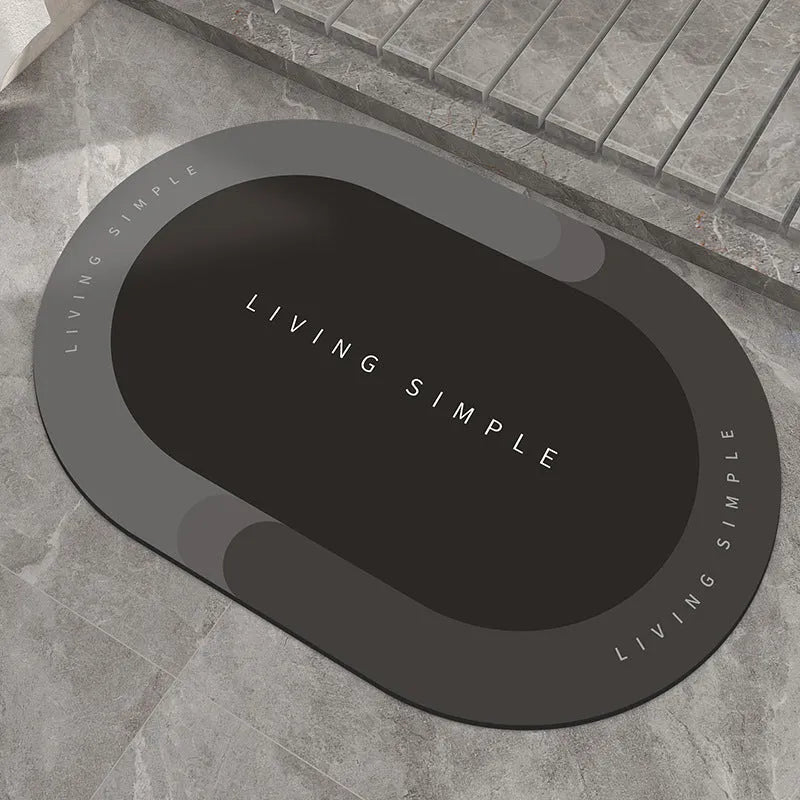 Super absorbent oval bath mat in grey with non-slip rubber bottom, 40x60cm