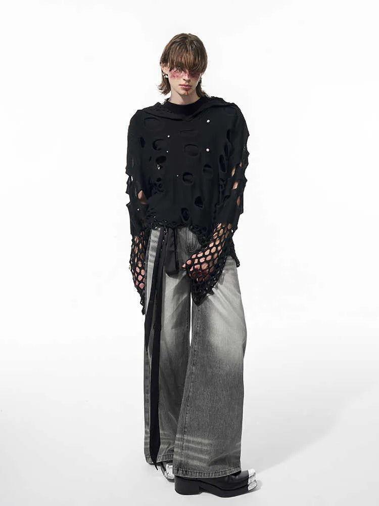 Black men's loose fit pullover hoodie with decorative pearls on the front of the hood.