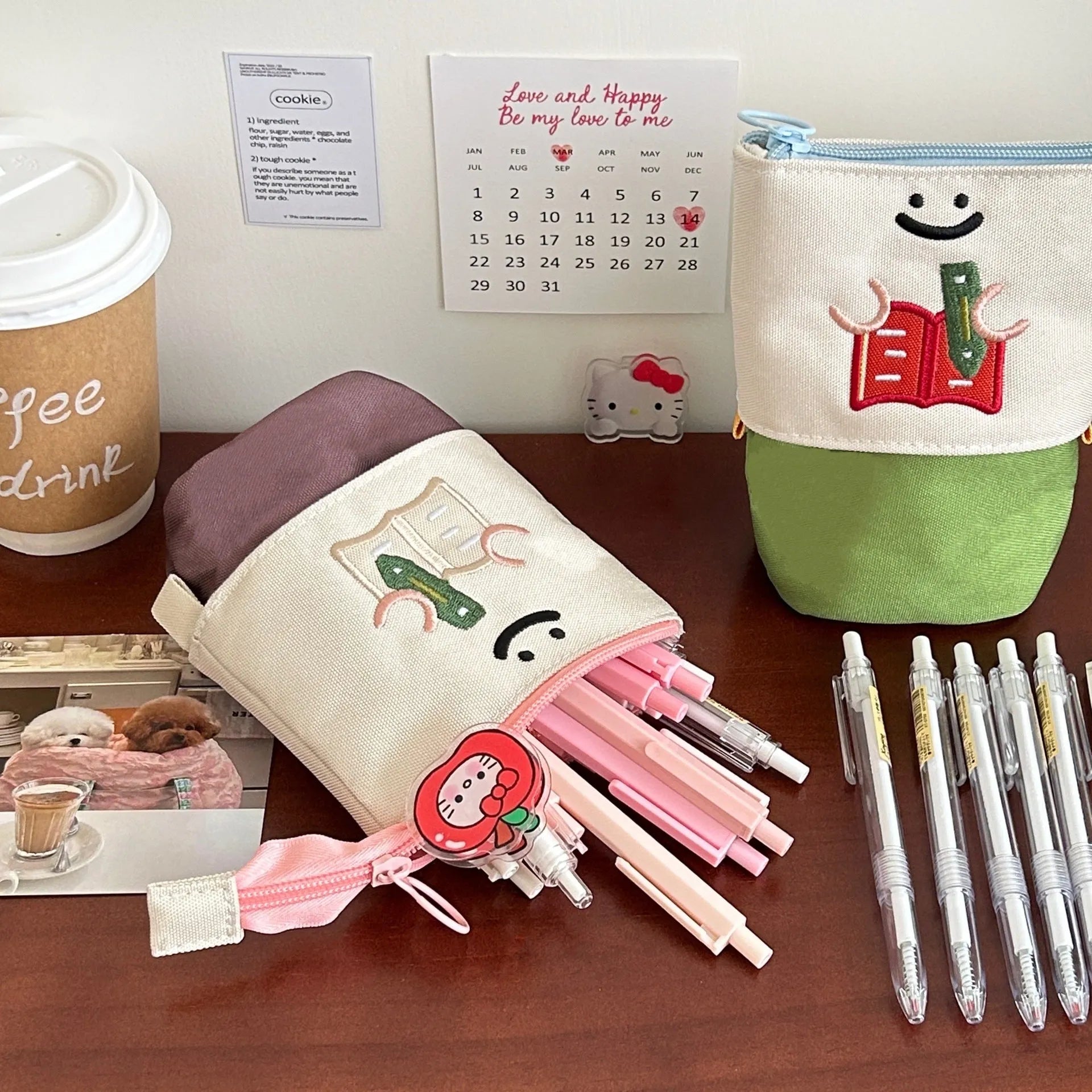 Brown Korean-style cartoon collapsible pencil case made from Oxford fabric, shown open to display its large capacity.