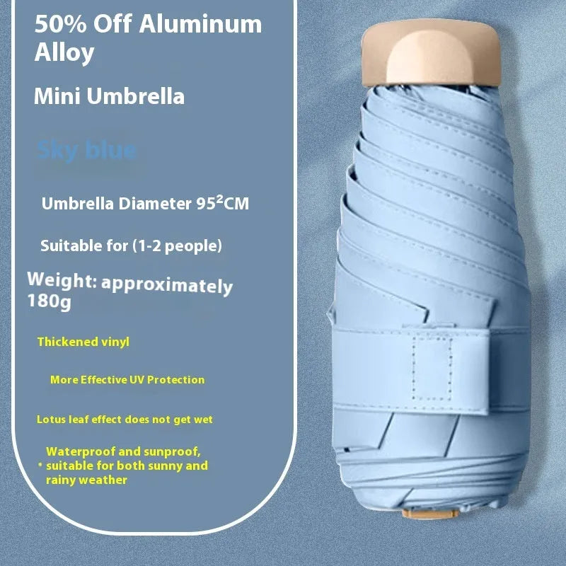 Closed five-fold sun umbrella with gradient vinyl lamination and alloy frame, shown in beige colour.