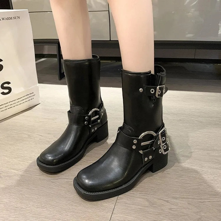 Women's black platform fashion boots with buckle straps and middle calf length