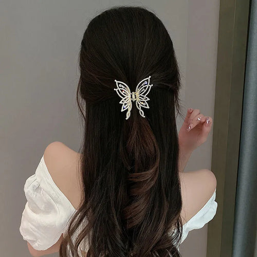 Butterfly design hair barrette for women with alloy construction and decorative rhinestone or pearl styling