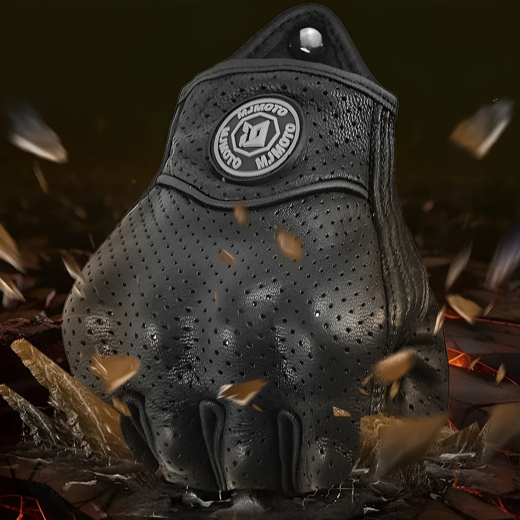 Retro Mo Trailer black sheepskin half finger riding gloves on a motorcycle handlebar