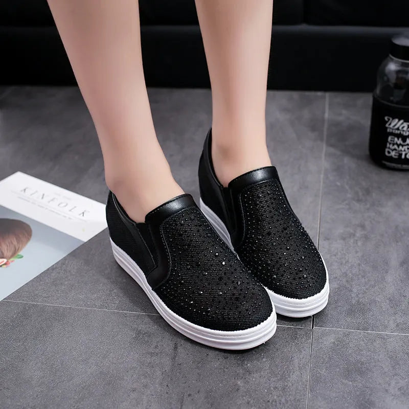 Women's wedge slip-on shoes in black with mesh upper and round toe