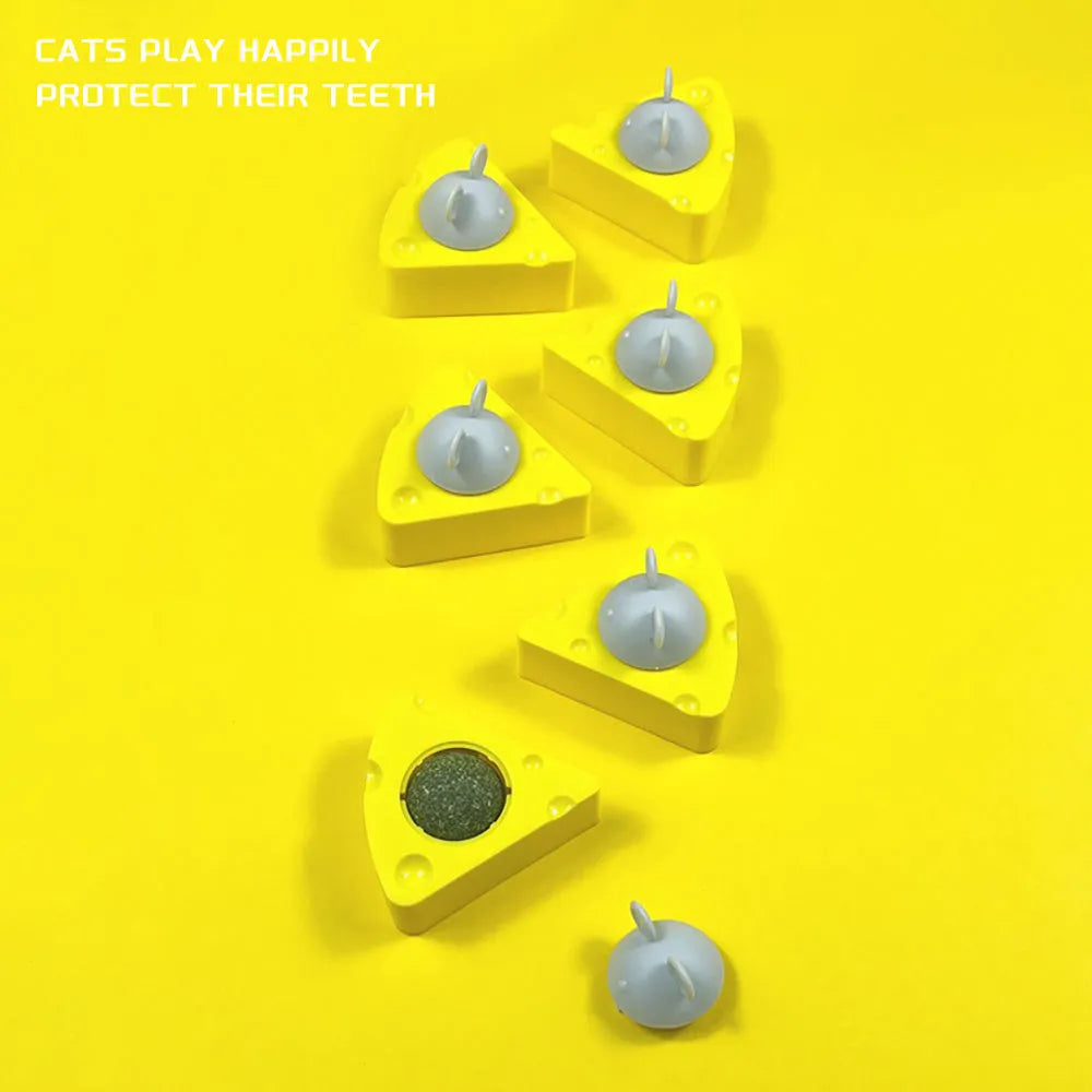 Yellow catnip and silvervine chew toy balls for indoor cat teeth cleaning and entertainment