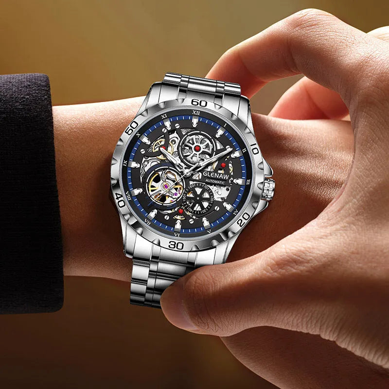 Silver stainless steel automatic skeleton watch with luminous markers and transparent case back