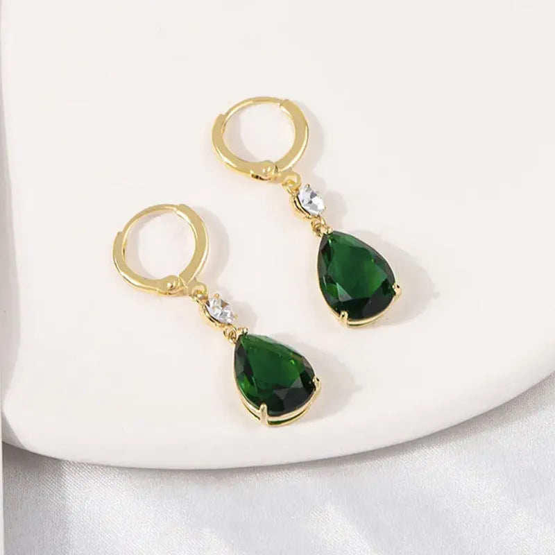 Green geometric teardrop alloy earrings with contemporary shape and lightweight construction