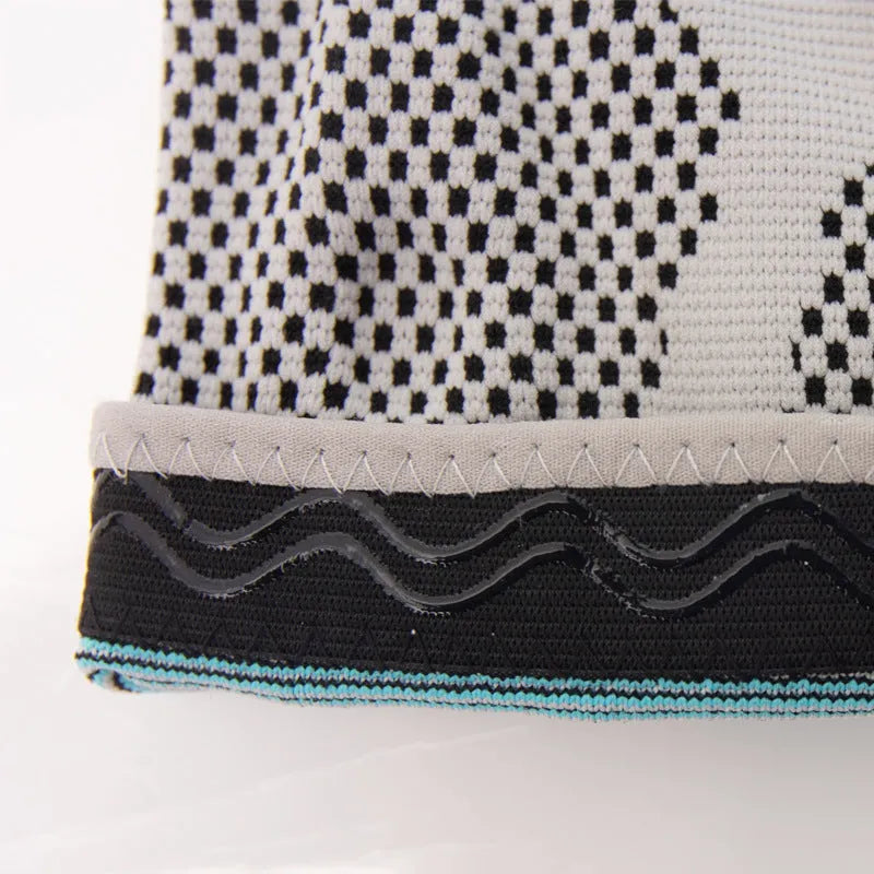 Sky blue silicone grip knee pad for sports, shown in elastic fibre material.