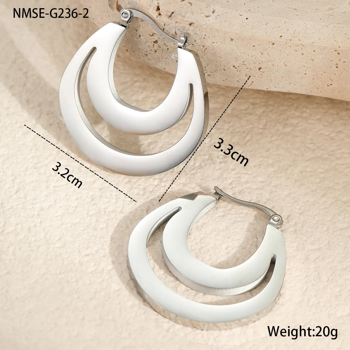 Geometric gold-plated French earrings with round ring elements, available in gold or steel colour