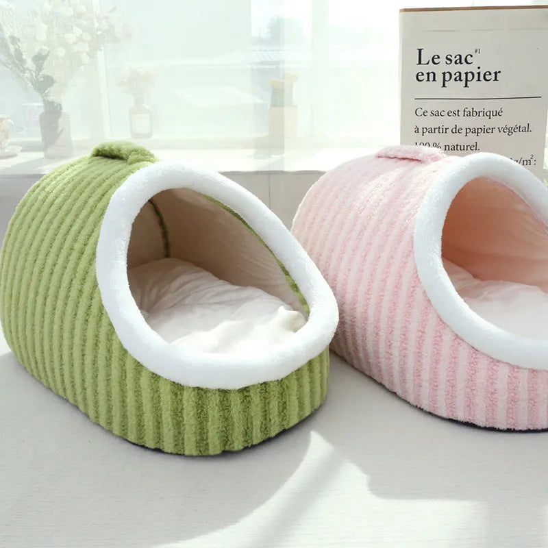 Macaron-shaped cat bed in blue colour, showing three-dimensional design with cloth material