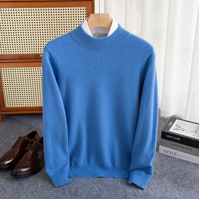 Man wearing a chunky knit half-turtleneck wool sweater in a loose fit.