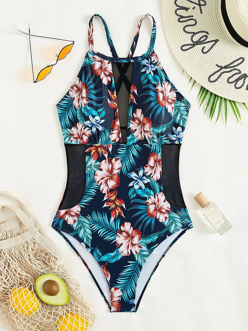 Women's deep V neck one-piece swimsuit on a hanger, showing solid colour or gradient print.