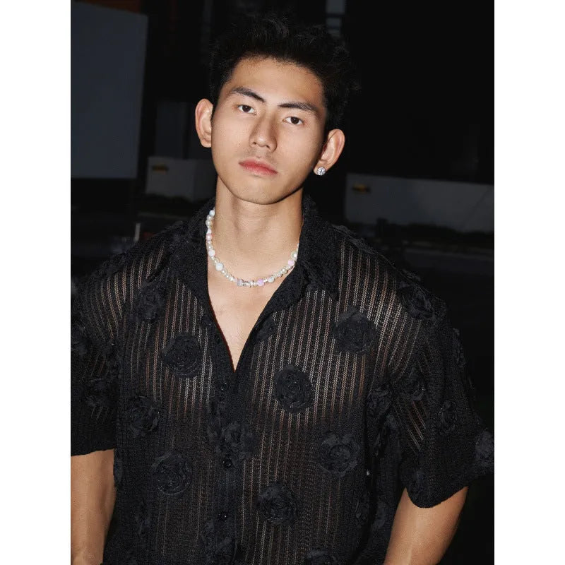 Men's loose fit short-sleeved shirt with a heavy industry floral print in milky white.