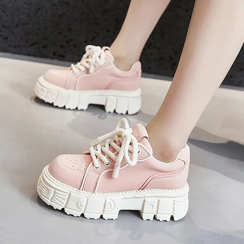 Women's beige and pink casual leather shoes with a rubber foam sole on a white background