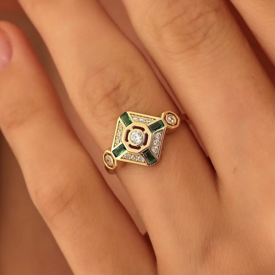 Square-cut lvzuan coloured gemstone ring on a silver-toned electroplated band.