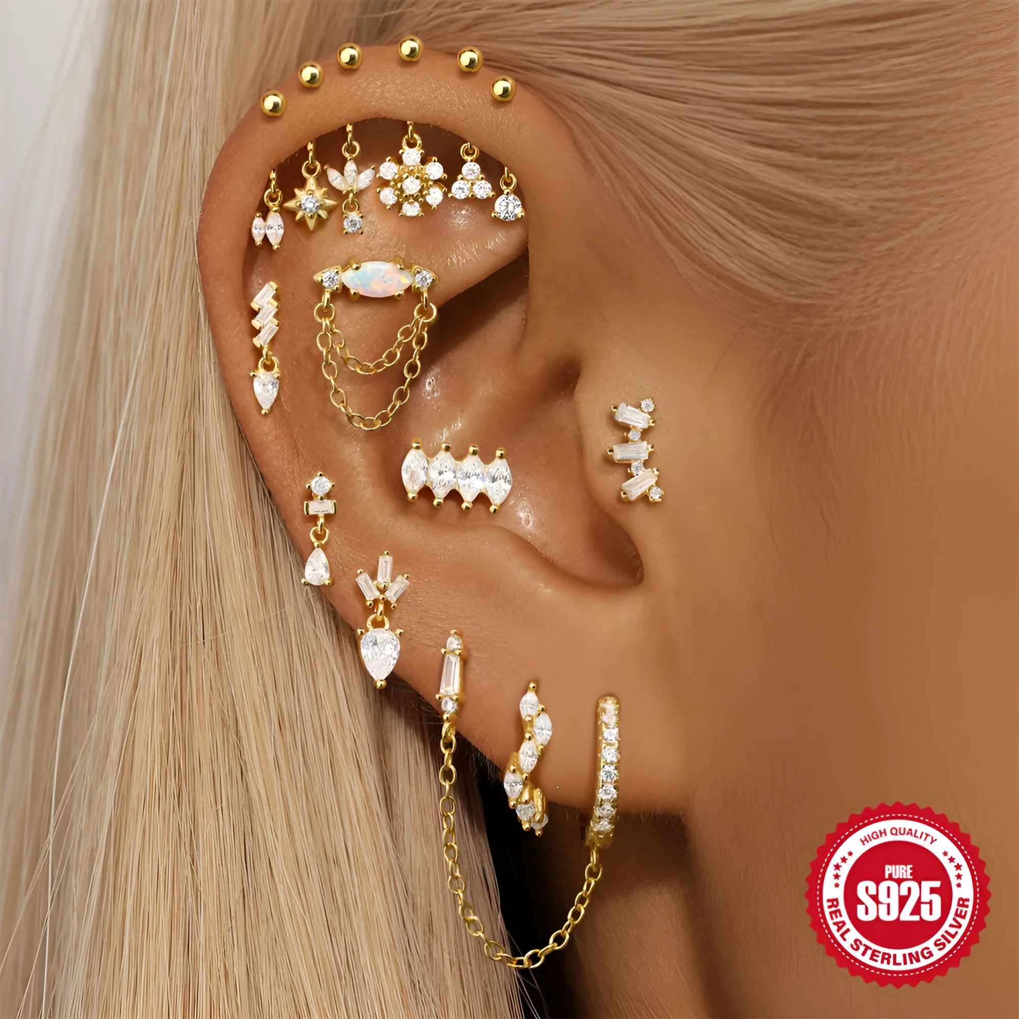 S925 sterling silver snowflake horse eye diamond ball flat back earrings in gold geometric shape on white background
