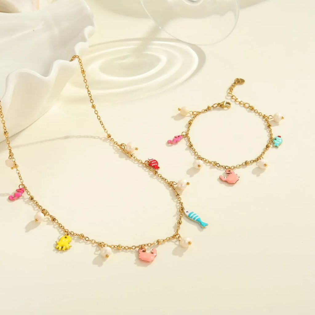 Stainless steel geometric pendant necklace with 18K gold-tone electroplating on a regular chain, model NMSBJ7464