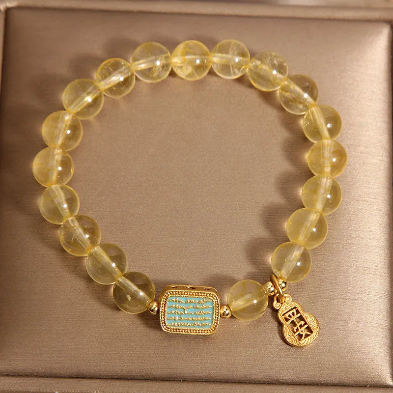 Women's natural citrine crystal bracelet with rhinestone decorative elements
