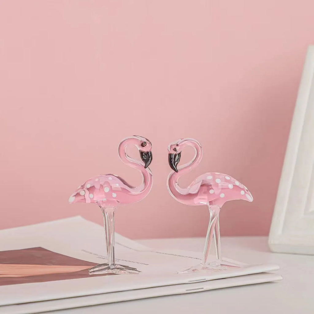 Pink flamingo crystal decorative figurine on a white base for modern home table decor.