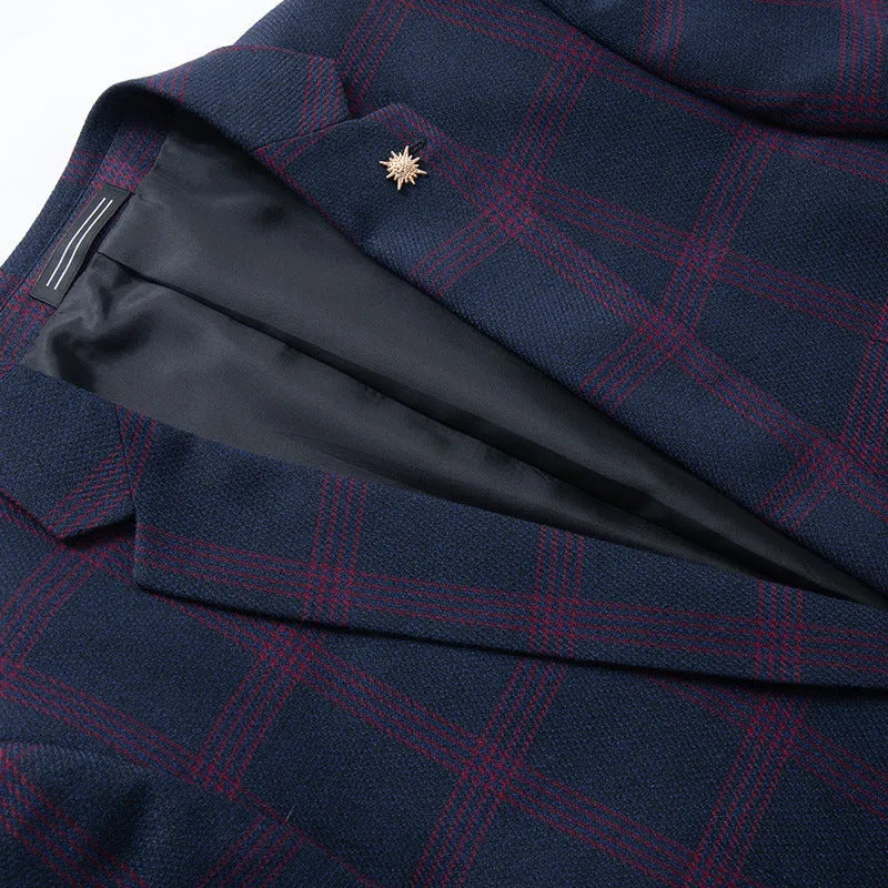 Men's slim fit casual suit coat in navy blue on a hanger, front view with two buttons and notch lapels