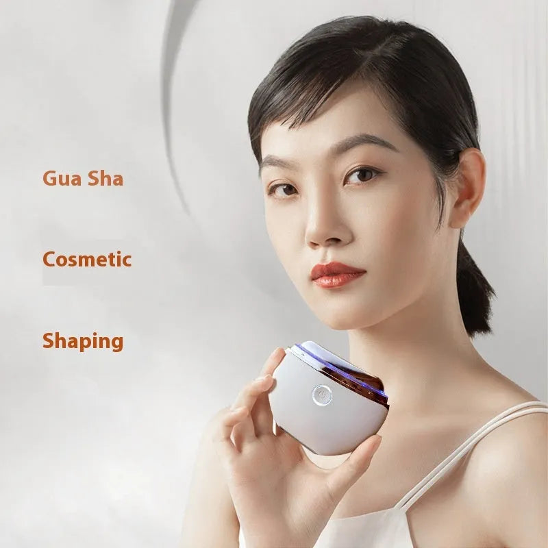 French pattern design household electric beauty instrument for scraping and photon light therapy.