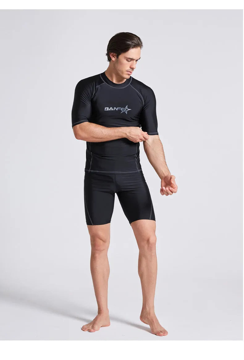 Men's quick-dry half sleeve swimsuit set in nylon fabric for snorkelling and surfing activities
