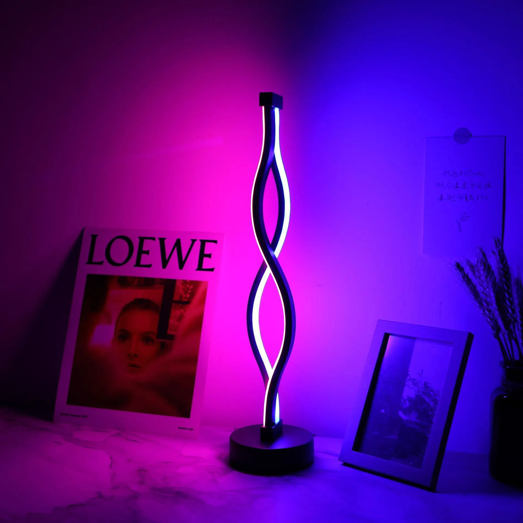 Black aluminium desk lamp with three-colour dimming button on creative stand