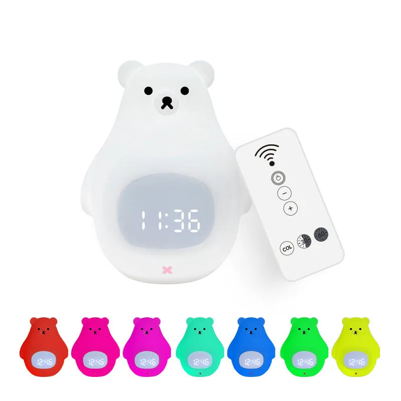 Big White Bear shaped silicone night light with colour-changing LED, showing remote control.