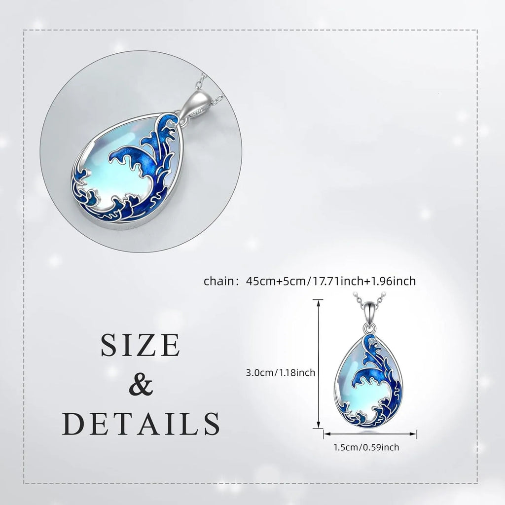 Close-up of a moonstone blue heart-shaped alloy pendant on a women's necklace chain.