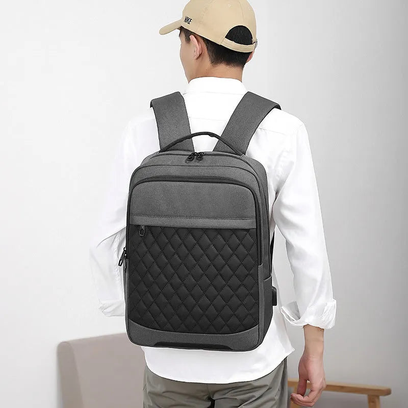 Men's Oxford cloth backpack with curved shoulder straps and diamond mesh details in solid colour