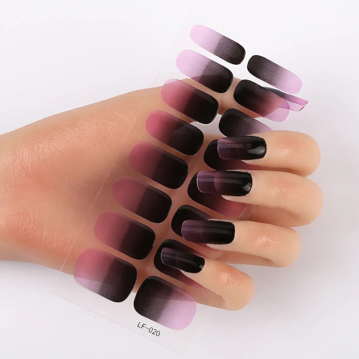 16 solid colour full nail art stickers with 22 patterns including cross, rose, butterfly designs in 12x6mm oval size