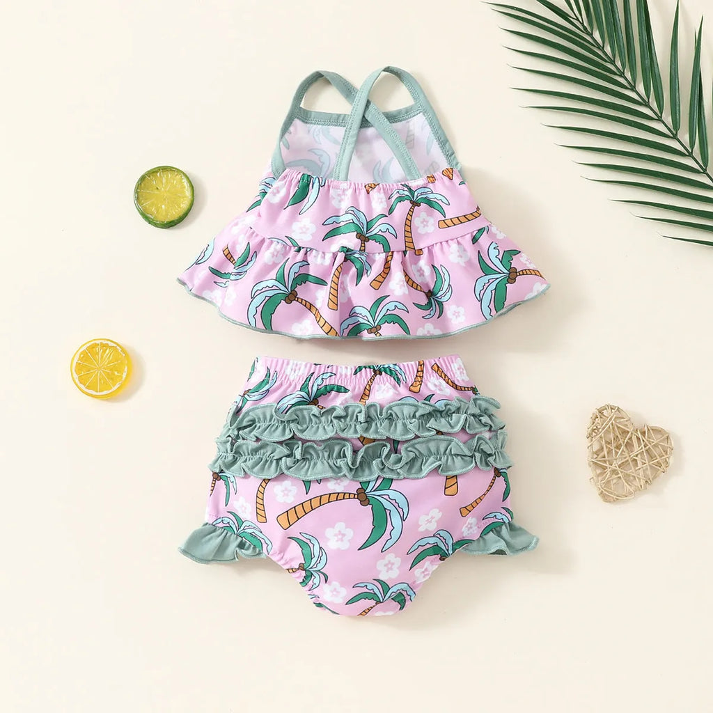 Girls' white two-piece swimsuit set with a top and shorts, made from polyester.