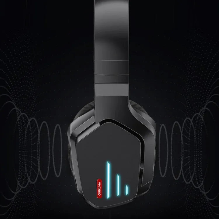 Luminous black wireless gaming headphones with head-mounted design showing ear cups and included 3.5mm cable