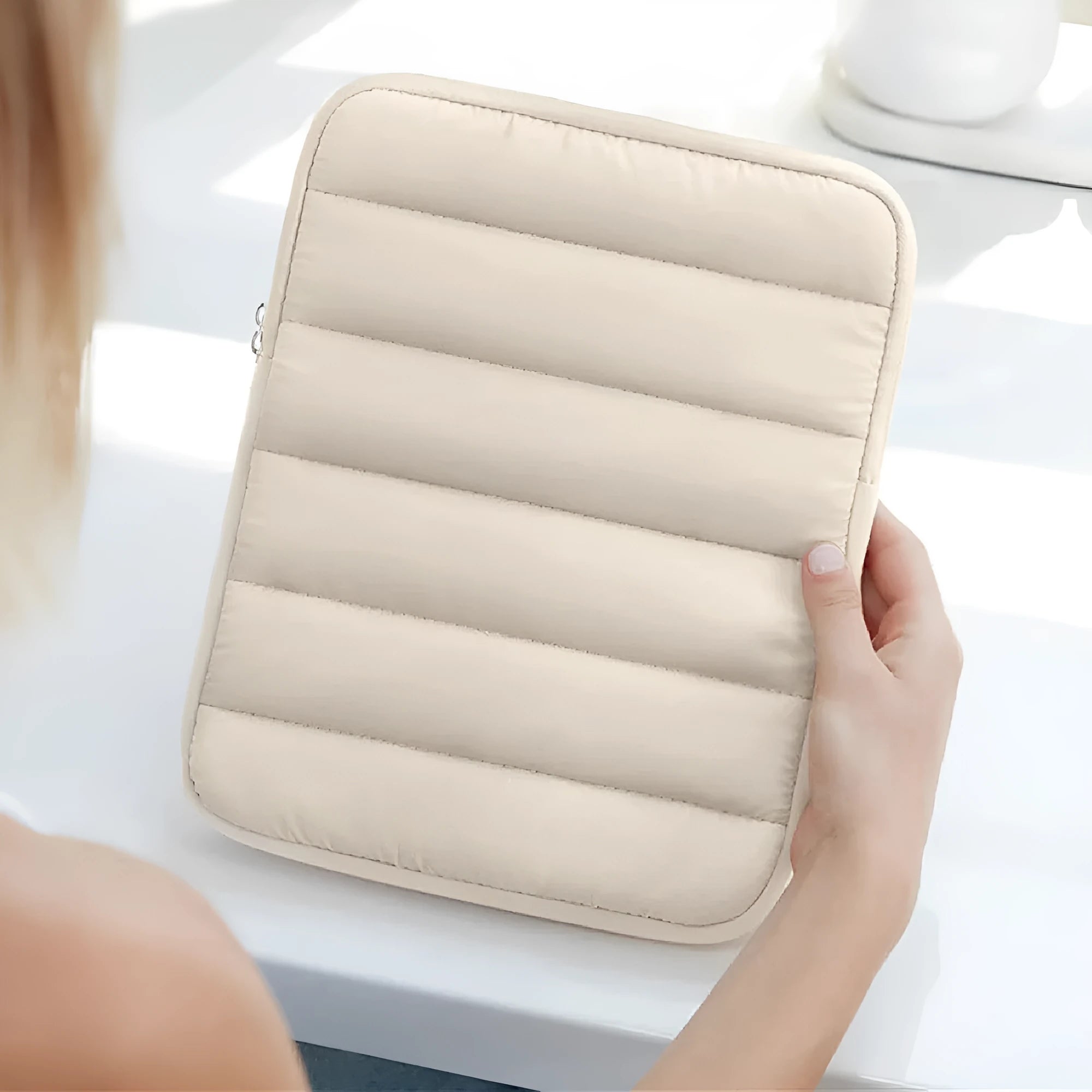 Puff bag laptop sleeve for 9.7-11 inch devices in black, khaki, or silver with elastic sides