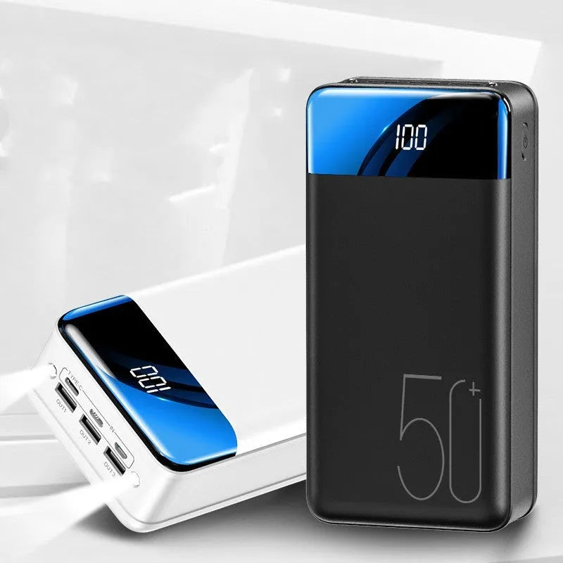 Black and white large 50000mAh portable power bank with three USB ports on the side