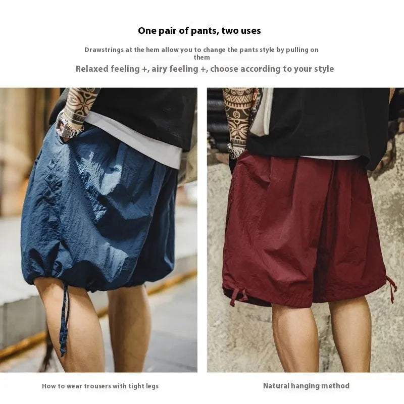 Men's embroidered loose fit nylon shorts in Prussian Blue colour with elastic waistband