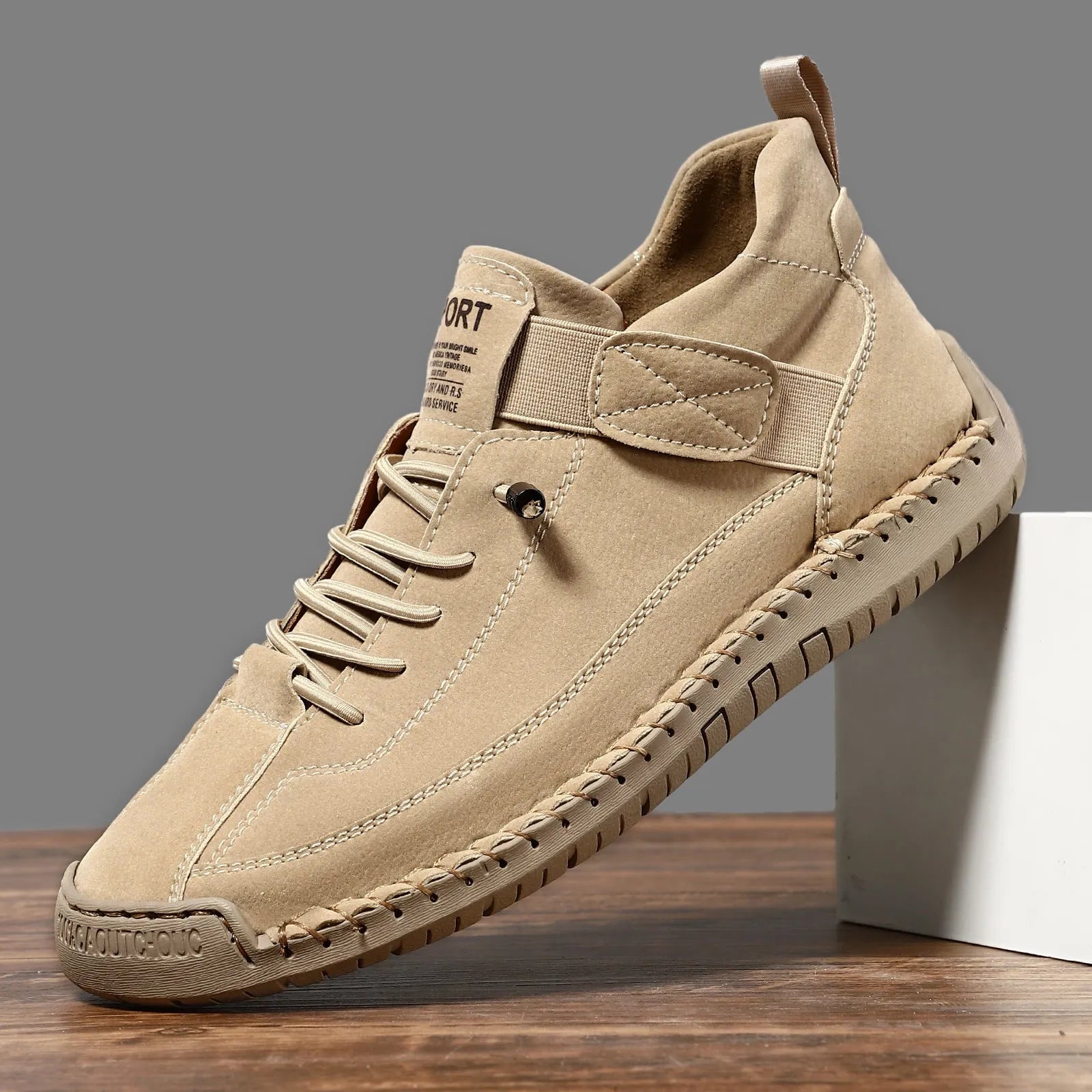 Men's mid-top Martin boots with microfiber upper, leather lining, and rubber sole in solid colour options for winter outdoor wear.