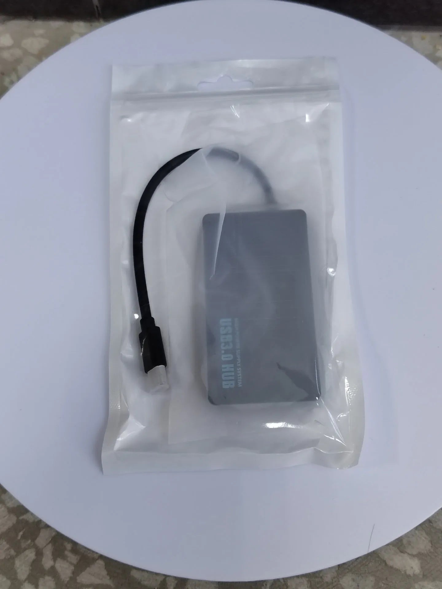 Type-C USB hub extender with 4 ports and 20cm cable in blister packaging
