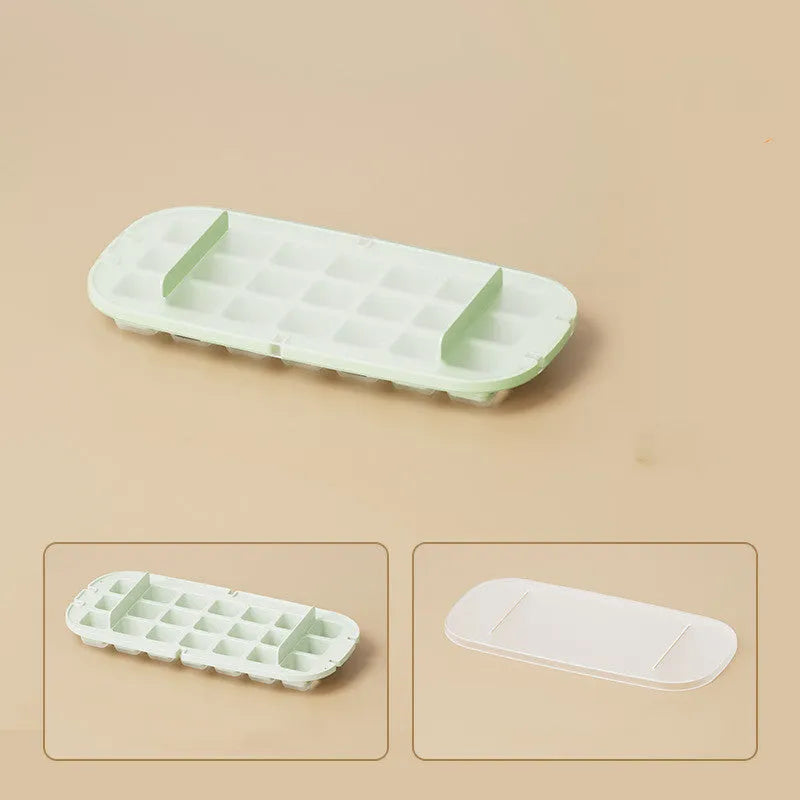 Yellow high-capacity grid ice cube tray with integrated storage slot for an ice shovel