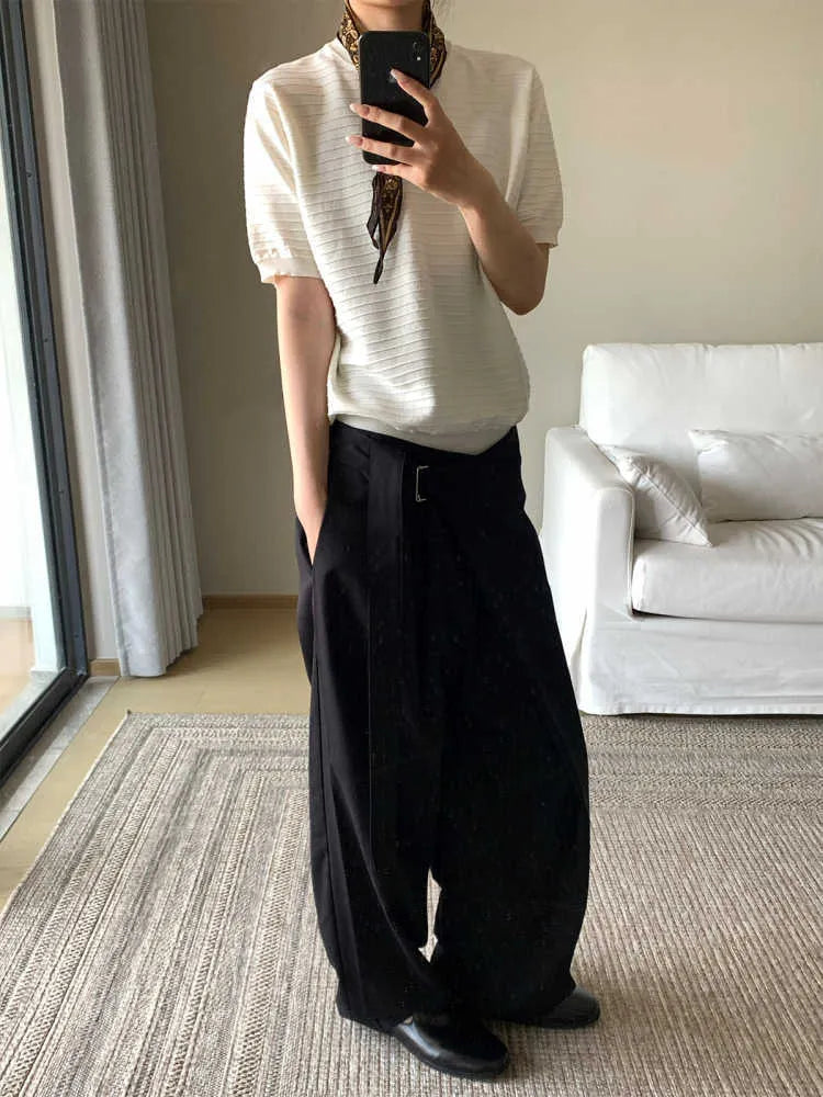 Black straight-leg trousers with adjustable waist and single pleat front in Tencel cotton blend fabric