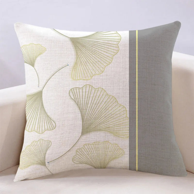 Ginkgo leaf printed square cushion cover on a sofa, available in multiple colours and sizes