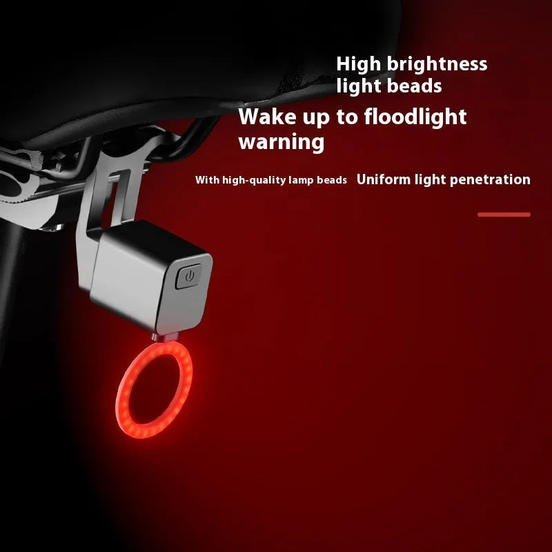 Bicycle tail light with flowing water effect mounted on bike seat tube for night riding safety