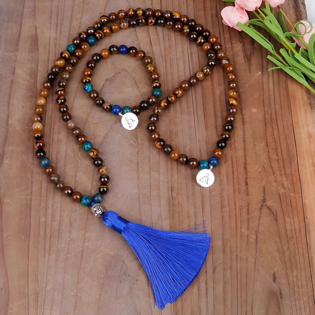 Handmade tiger eye stone bead necklace with Buddha head design, tassel pendant, geometric shape, and 81cm length.